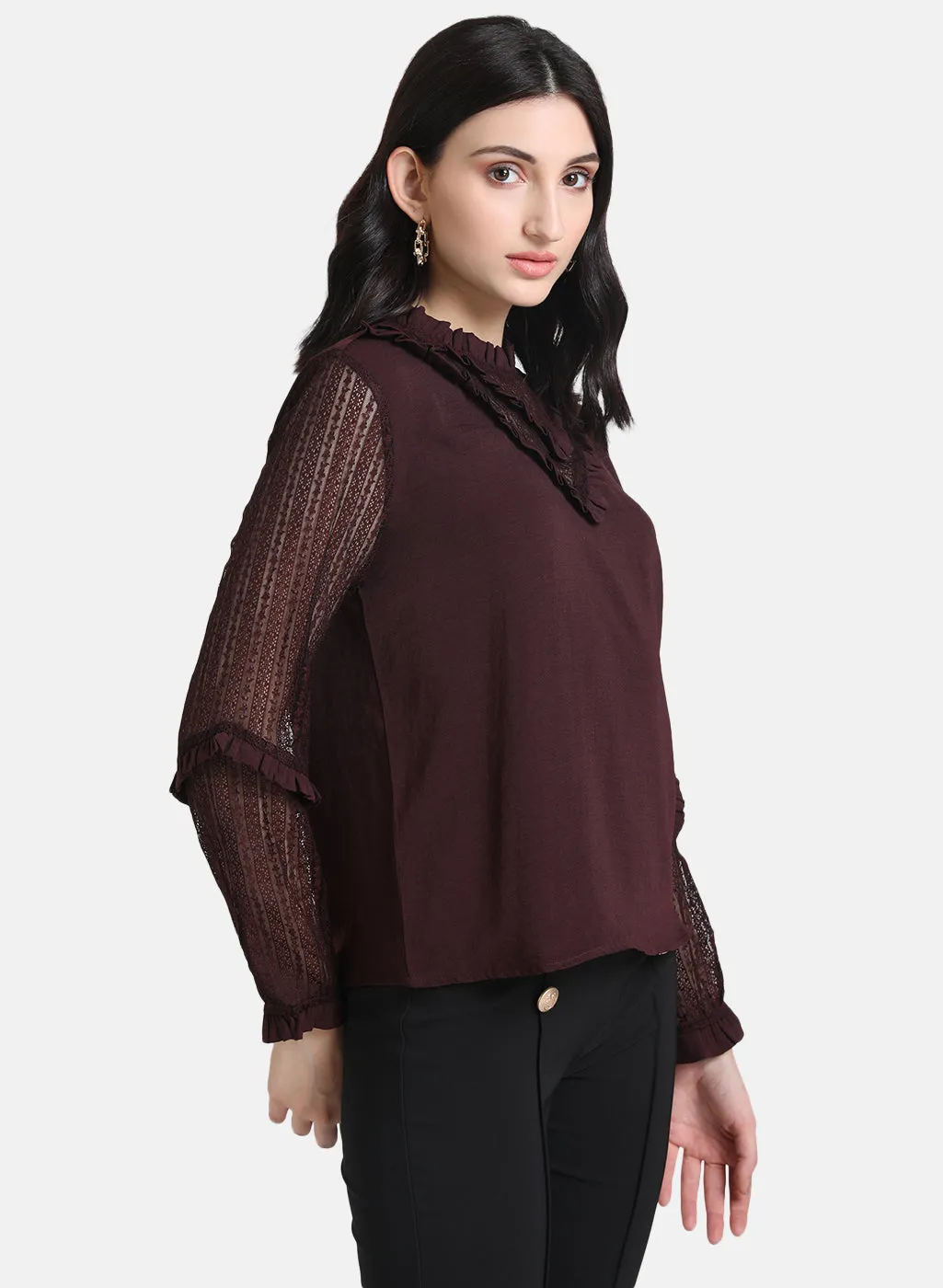 Top With Ruffles At Neck And Sleeves.